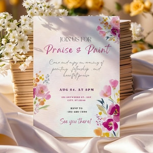 Può includere: Un invito per un evento "Praise & Paint". Il design presenta accenti floreali ad acquerello in rosa, viola e giallo. Il testo include i dettagli dell'evento: data, ora, luogo e informazioni RSVP. L'invito è su uno sfondo morbido e neutro.