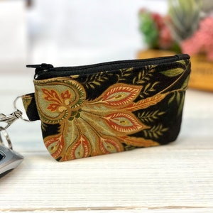 Bolsa floral preta com zíper - presentes para ela - bolsa pequena de maquiagem