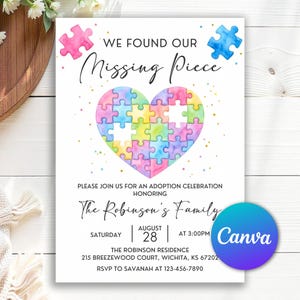 May include: A white invitation card with the text "WE FOUND OUR Missing Piece". It features a watercolour heart made of puzzle pieces in pastel colours. The card includes event details and the Canva logo.