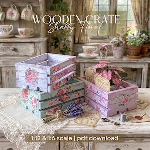 May include: Miniature wooden crates with floral patterns in pink and blue. The crates, decorated with roses, are labelled "WOODEN CRATE Shabby Floral". The image includes a plant, seed packets, and a key. Measurements are 1:12 & 1:6 scale.