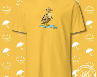 Camiseta de patito de primavera: Camiseta gráfica de patito con paraguas bajo la lluvia