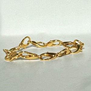 The name of the collection is Untold, chine,  the Lobster Clasp creates a secret, one-of-a-kind, unique shape!
