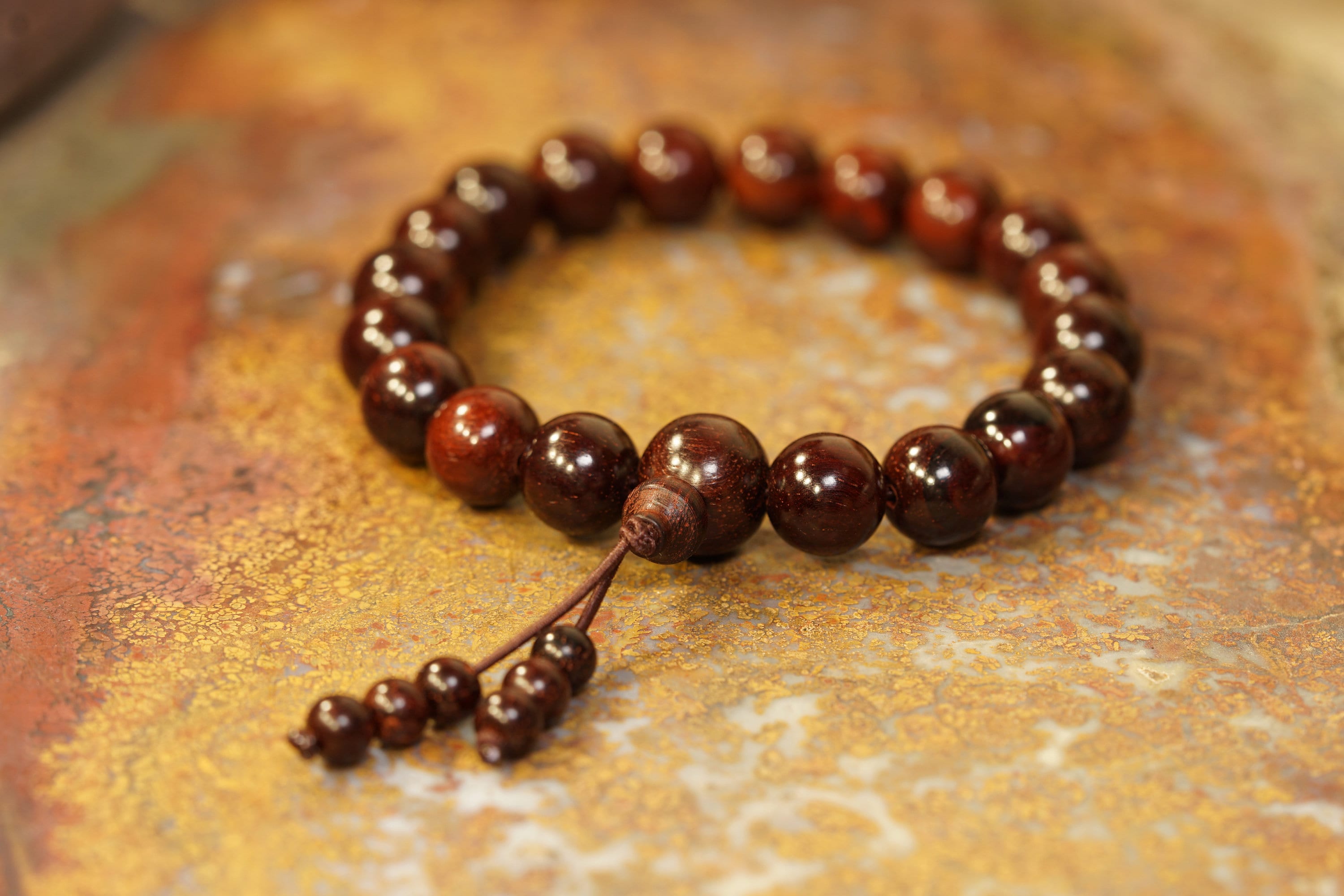 Red Wooden Beads and Bracelet on a Wooden Background Stock Image - Image of  bright, macro: 112335121