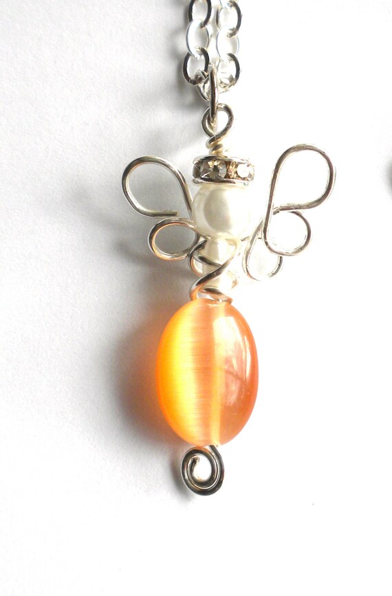 Items similar to Orange Wire Wrapped Angel on Etsy