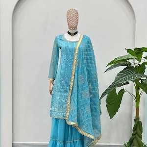 Trajes salwar kameez confeccionados para bodas, de diseñador pakistaní, en georgette con bordado completo de lentejuelas.