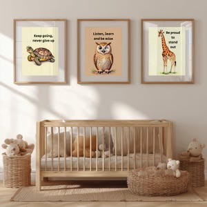 May include: Three framed art prints with motivational quotes and animal illustrations. The prints feature a turtle, an owl, and a giraffe, with text that reads "Keep going, never give up", "Listen, learn and be wise", and "Be proud to stand out".