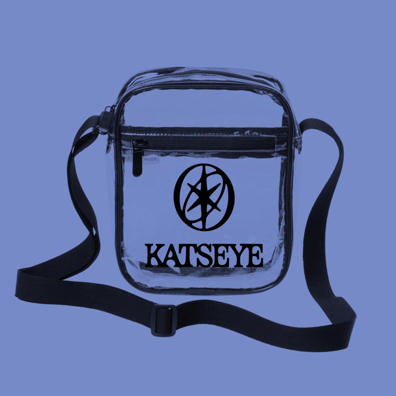 May include: A white ceramic mug with a black handle and the text "But First, Coffee" in a handwritten style. The mug is on a white surface. The mug is approximately 4 inches tall.