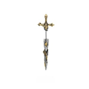 May include: A sword-shaped earring featuring a gold-toned hilt with intricate detailing and a silver-toned blade section. The design includes a central metal post connecting the hilt to the blade, creating a two-piece appearance with metallic accents.