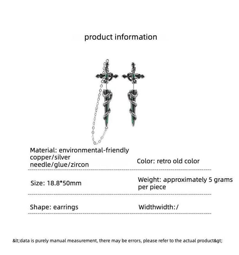 May include: A pair of silver-toned earrings featuring a cross design with a central green zircon, connected to a dagger-shaped pendant wrapped in a snake motif. One earring includes a delicate chain. Dimensions are 18.8 by 50 mm, weighing 5 grams.