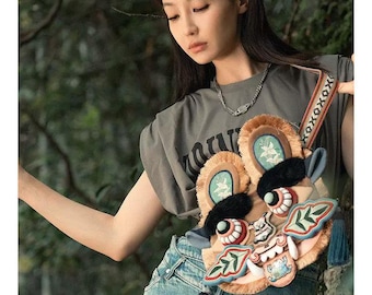 Elon Musk's Son China Visit Same Bag，Traditional Chinese tiger head design, hand-embroidered by ethnic minority artisans
