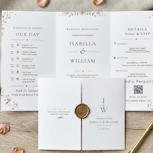 Könnte beinhalten: Elegante Hochzeitseinladungssuite mit einer dreifach gefalteten Karte mit Veranstaltungsdetails und RSVP-Informationen sowie einer kleineren Karte, die mit einem goldenen Wachssiegel versehen ist. Isabella & William.
