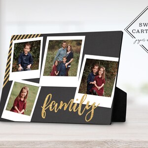 May include: Black photo frame with a gold glitter "family" inscription and five Polaroid-style photos of a family. The frame has a black stand.