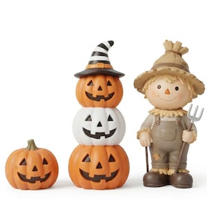May include: A set of three decorative figurines featuring a small orange jack-o'-lantern, a vertical stack of two orange and one white jack-o'-lanterns topped with a black and white striped witch hat, and a scarecrow holding a silver pitchfork.