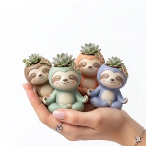 May include: Four small, colorful sloth-shaped planters, each holding a succulent plant. The planters are in shades of brown, peach, blue, and green. The sloths are in a seated yoga pose with closed eyes, and are decorated with small flower accents.
