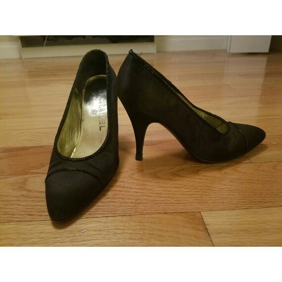 black beaded pumps