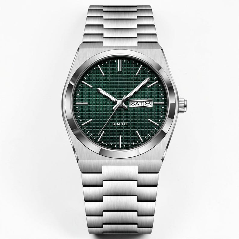 May include: A silver-toned quartz watch with a green dial and a matching silver band. The watch face displays the day and the word "QUARTZ". The watch has a rectangular case and a link-style bracelet.