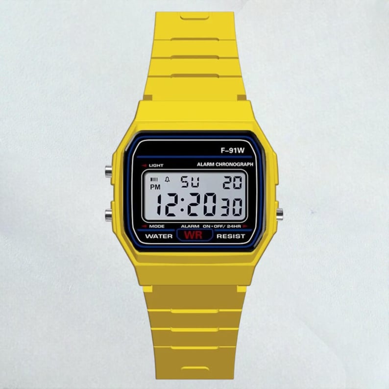 May include: A yellow digital watch with a black and blue display. The watch face displays the time, day, and date. The watch band and case are yellow. The watch has the text "F-91W" and "WATER WR RESIST".