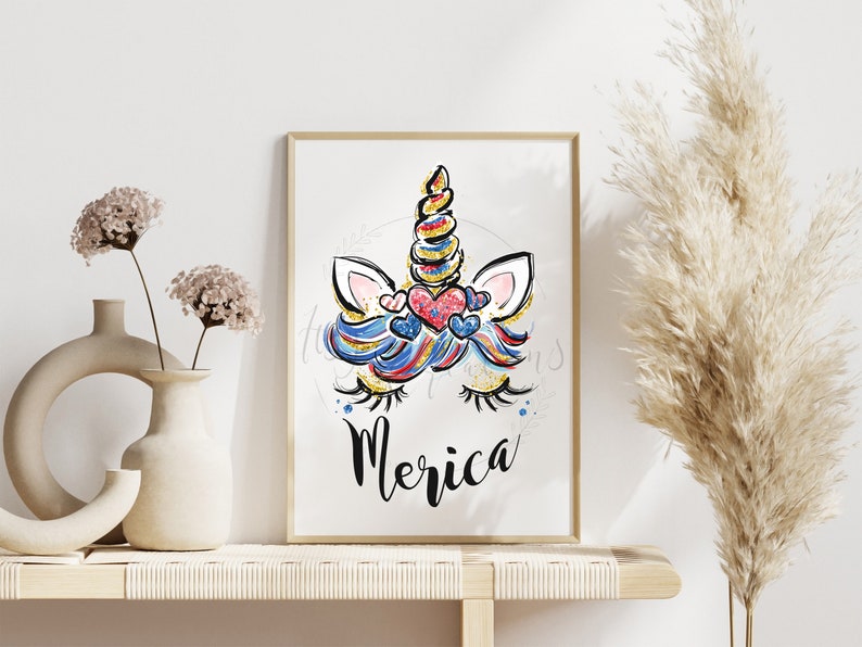 May include: A white unicorn head with a gold glitter horn and blue, red, and white mane. The unicorn has red hearts around its eyes and the word "Merica" written below.