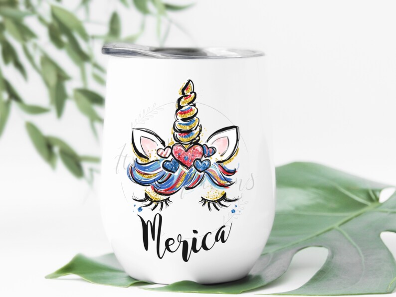 May include: White stainless steel wine tumbler featuring a red, white and blue unicorn design with the word "Merica" in black lettering.