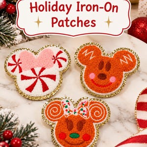 May include: Three embroidered iron-on patches shaped like mouse heads with gold glitter borders. One is white with a pink bow and red peppermint swirls, one is brown gingerbread-style, and one is orange with a colorful bow and swirls.