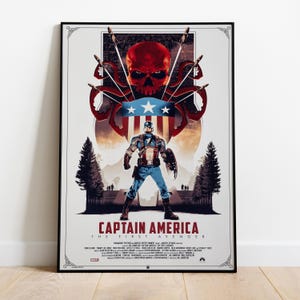 May include: A framed Captain America movie poster. The poster features Captain America in a heroic pose, with a red skull and tentacles above him. The title "Captain America: The First Avenger" is displayed at the bottom.
