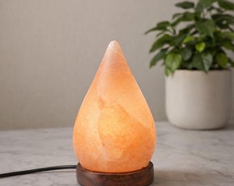 Traan Himalayazoutlamp: natuurlijk roze kristalsteen, houten voet