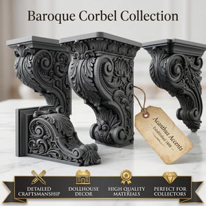 May include: Three dark gray corbels featuring intricate acanthus leaf carvings and scrollwork. A beige paper tag attached to one corbel displays the text Acanthus Accents Established 1888. The text Baroque Corbel Collection appears at the top.