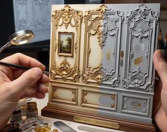 May include: A miniature wall panel display titled Rococo Suite No. 1 - Master Painter Edition, featuring ornate gold molding on the left and grey primer on the right, with a small landscape painting and a wooden base, held during painting.