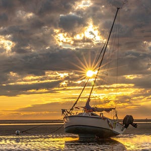 Sailboat resting on the Brewster Flats waiting for the tide to come in