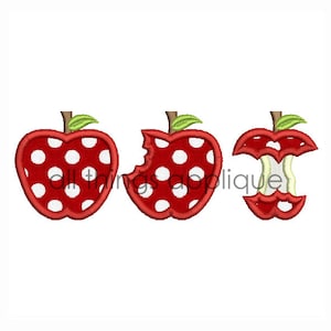 May include: Three embroidered red apples with white polka dots. One apple is whole, one is partially eaten, and the last is cored. Each apple has a green leaf and a brown stem. The text "all things applique" is in the center.