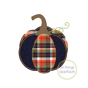 May include: A blue and red plaid pumpkin with a brown stem and green vine. The pumpkin is outlined in yellow thread. "All things applique" is written in green text on a white circle.