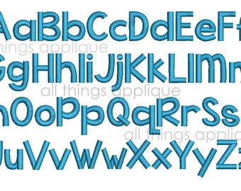 May include: A blue alphabet font with a rounded, outlined style. The letters are arranged in three rows, with the first row being A through F, the second row being G through M, and the third row being N through Z. The text "all things applique" appears below each row.