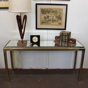 Mid Century Modern brass and mirror console table image 1