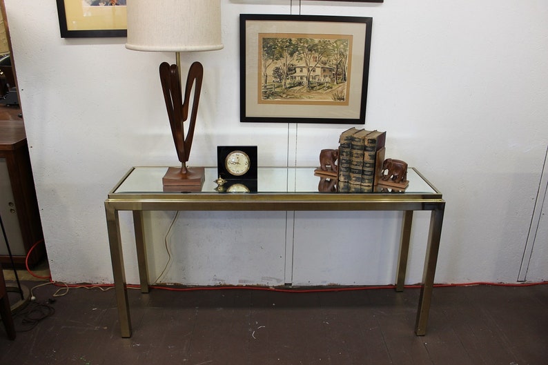 Mid Century Modern brass and mirror console table image 1