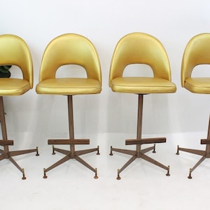 Mid Century Modern gold vinyl bar stools 1960's image 1