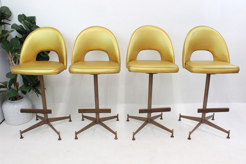 Mid Century Modern gold vinyl bar stools 1960's image 1