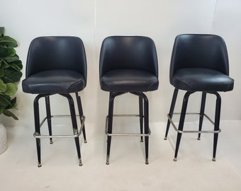 Mid Century Modern black vinyl bar stools 1960's