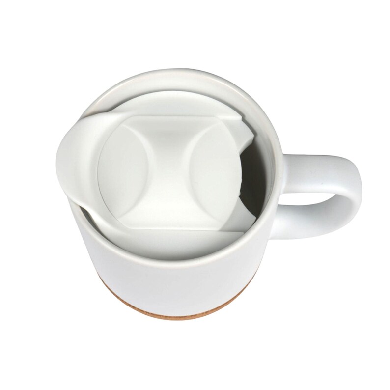 May include: White ceramic travel mug with a white lid and a cork base. The mug has a handle and is designed for hot or cold beverages. The lid has a sliding mechanism to open and close the drinking spout.