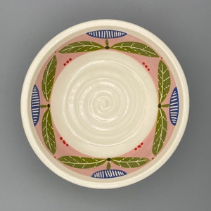 BOWL, medium, deep, for cereal, soup, small salad, side dish.  Modern, geometric flower motif.  Matching latte cup.
