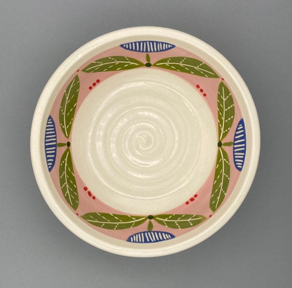 BOWL, medium, deep, for cereal, soup, small salad, side dish.  Modern, geometric flower motif.  Matching latte cup.