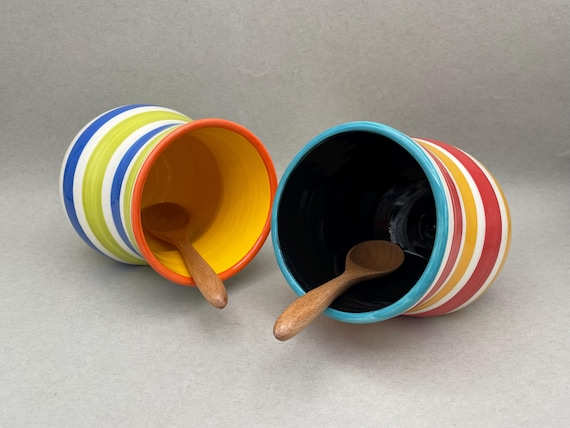 SALT CELLAR, salt pig, sugar bowl, condiment holder, colorful striped design. Mug shaped with side flattened. Comes with wooden spoon.