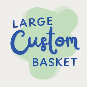 May include: A graphic design featuring the text LARGE Custom BASKET in a bold blue font. The word LARGE is in a sans-serif typeface, Custom is in a cursive script, and BASKET is in a sans-serif typeface, all set against a light green blob.