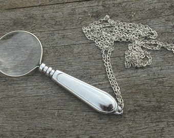 Magnifying lens on chain