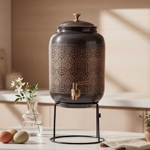 May include: A rustic wooden sign with the text "Welcome to our home" in white lettering. The sign has a distressed finish and a simple, inviting design, ideal for front door decor.