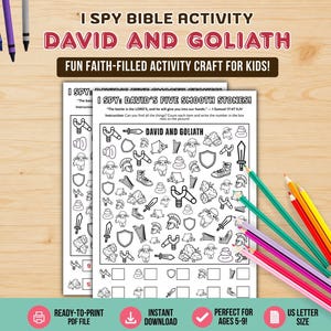 May include: A printable I Spy Bible activity sheet titled David and Goliath featuring black and white line art illustrations of slingshots, swords, shields, and sheep. The page includes a counting task and is surrounded by several colored pencils.