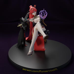 May include: A detailed figurine of a woman with red hair and a black and red outfit, seated on a red cushion. She holds a glowing purple orb. A black figure stands to her left. The base is black, with text at the bottom.