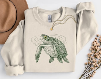 Felpa con tartaruga galleggiante, maglietta divertente con grafica di animali