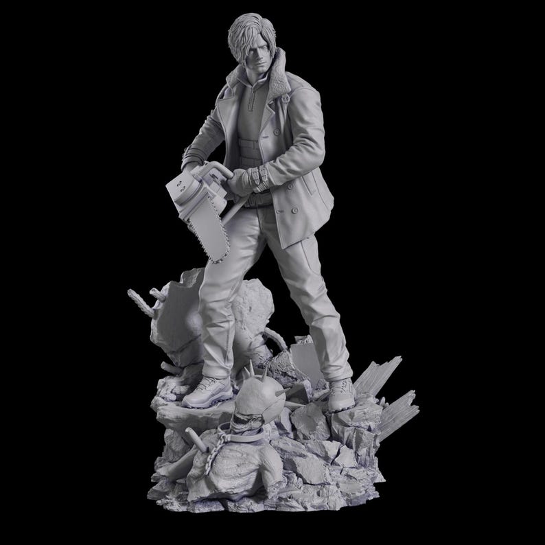K&ouml;nnte beinhalten: Eine monochrome graue Harzfigur eines Charakters mit Kragenjacke und Hose, der eine Kettens&auml;ge in der rechten Hand h&auml;lt. Die Figur steht auf einem Sockel aus zerkl&uuml;ftetem Schutt und Tr&uuml;mmern, mit einem stacheligen, behelmten Kopf zu F&uuml;&szlig;en.