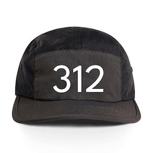 May include: Black five-panel cap with a flat brim. The cap features the white number "312" prominently displayed on the front panel. The hat is made of a dark, possibly nylon, material.