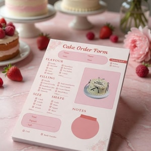 May include: A pink and white cake order form with a cake illustration. The form includes sections for flavor, filling, size, and shape. Strawberries and cakes are in the background.